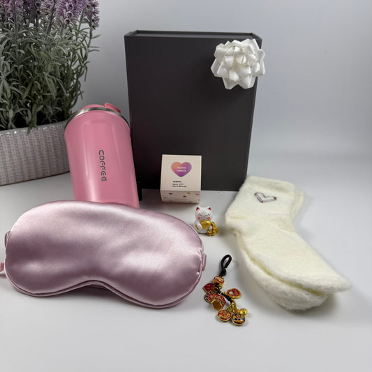 Pink Self Care Gift Box – Travel Mug, Cozy Socks, Eye Mask & Candle